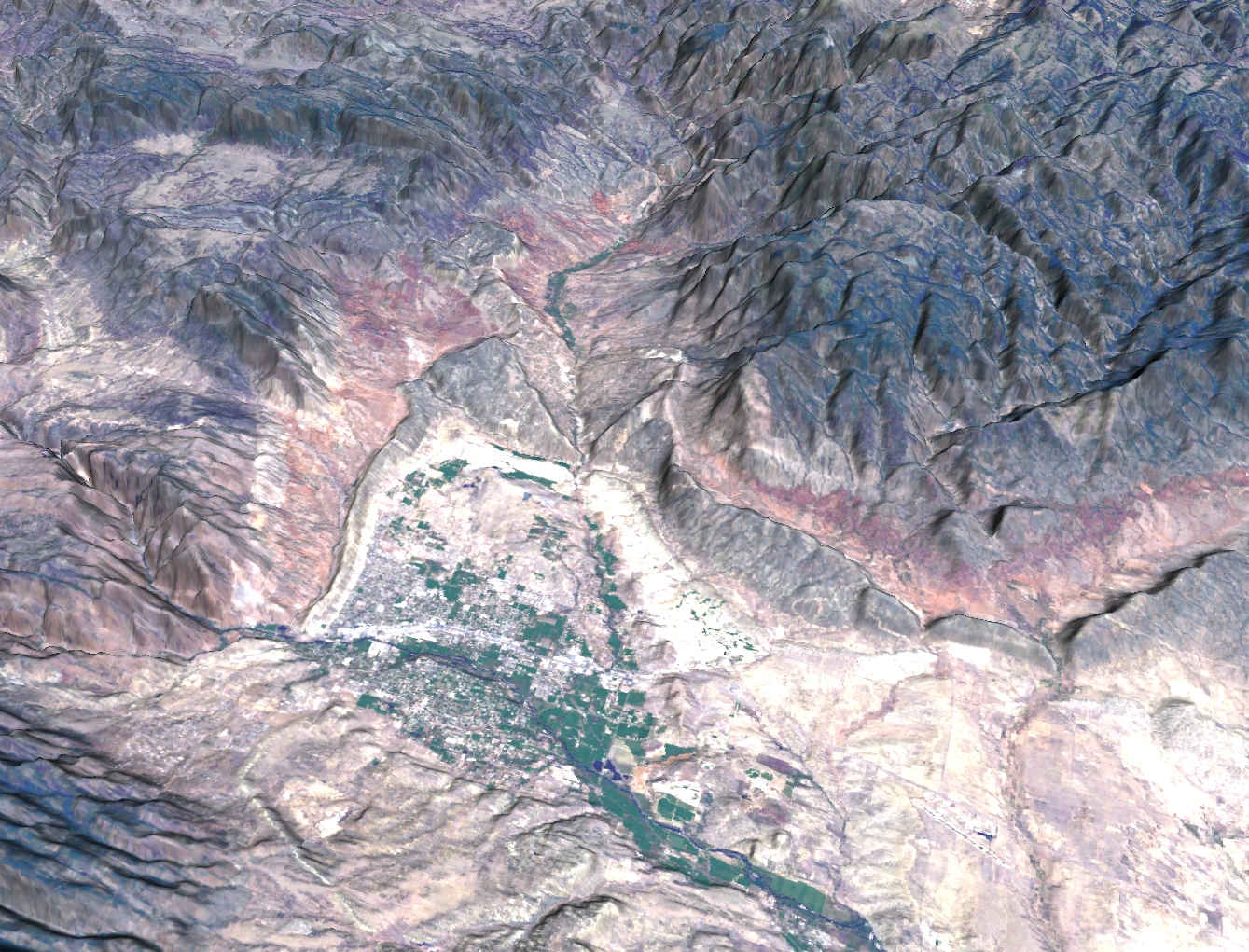 This off-nadir view of Colorado illustrates Scene Constructor’s 2.5D representation of the landscape. A digital elevation model captures terrain relief, while individual trees and buildings are not explicitly represented as three-dimensional objects. Future development could introduce hierarchical levels of detail to incorporate finer-scale structures where needed.